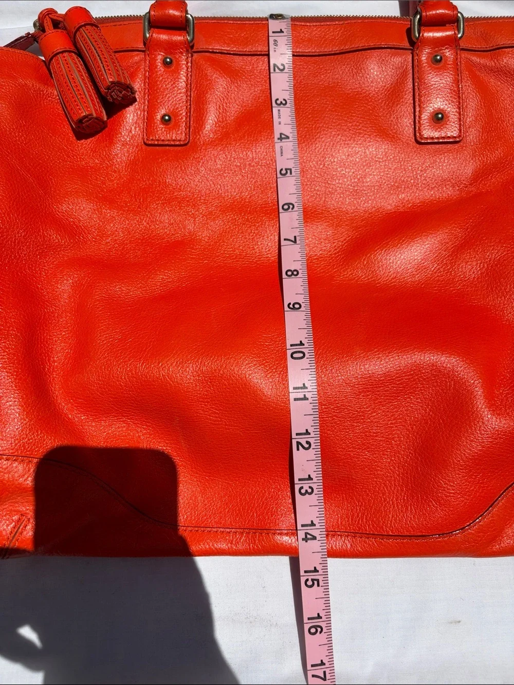 kate spade Bright Orange Leather Tote with Tassel